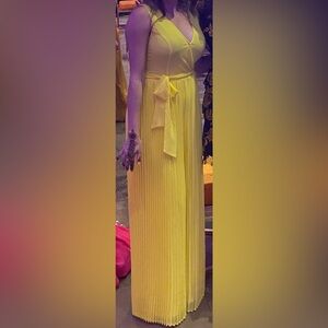 Yellow jumpsuit. Pleated size small.